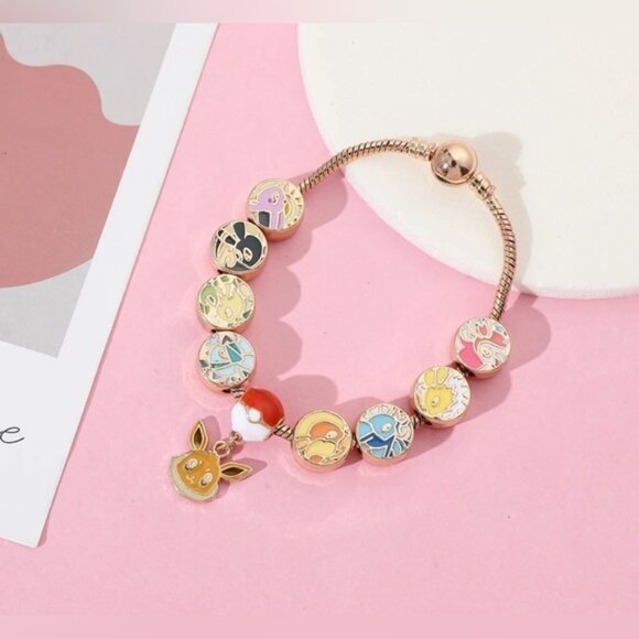 ⭐️NEW⭐️ Gold Plated & Enameled Pokémon Eevee Eeveelution Themed Charm Bracelet - Picture 5 of 8